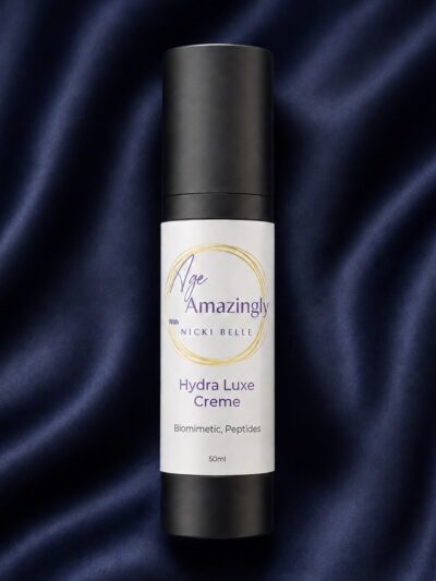 Age Amazingly with Nicki Belle Hydra Luxe Creme 50ml in a black airless pump bottle.