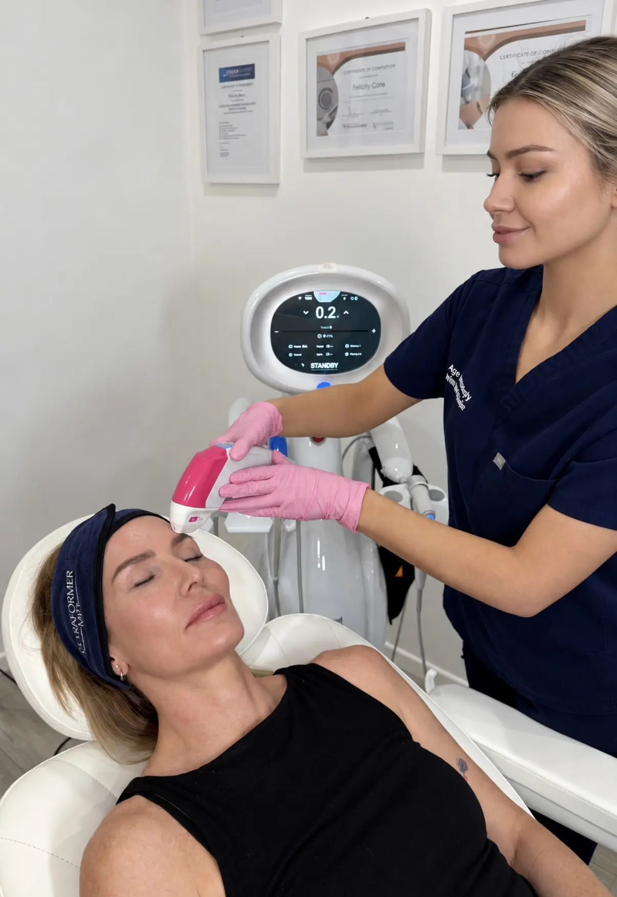 A clinician at Age Amazingly in Cairns carrying out an Ultraformer MPT micro focused ultrasound treatment.